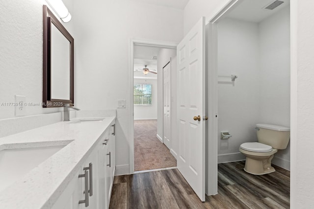 2556 SE 15th Ct, Homestead, FL 33035 - full bath featuring visible vents, wood finished floors, ceiling fan, and a sink