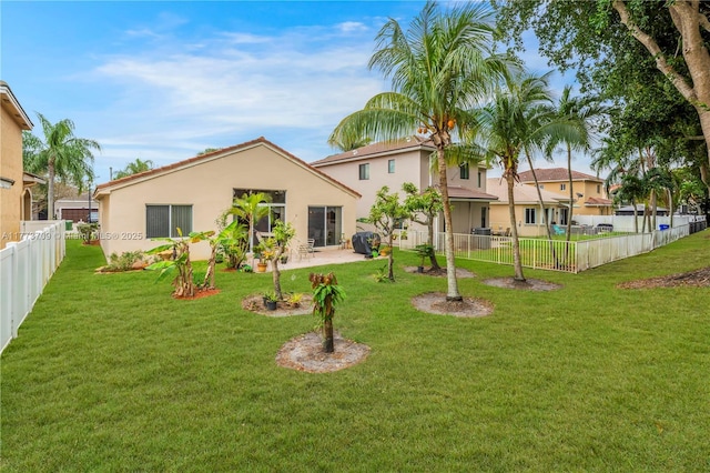 6231 SW 195th Ave, Pembroke Pines, FL 33332 - back of house featuring stucco siding and a patio area