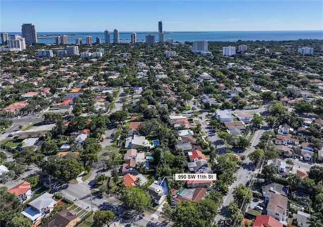 aerial view featuring a water view and a city view