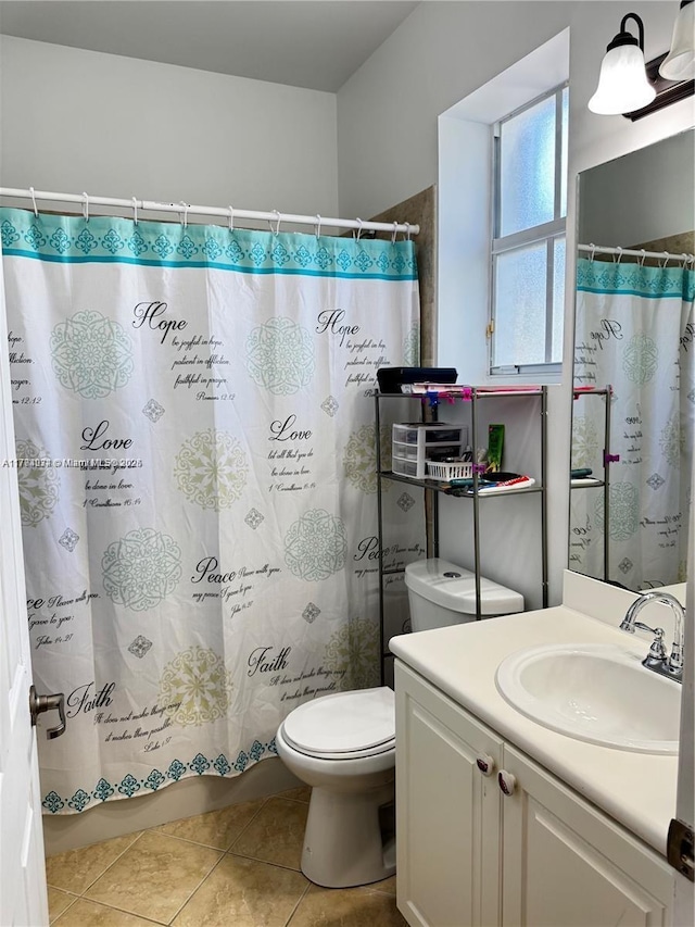 full bath featuring toilet, tile patterned floors, vanity, and shower / bathtub combination with curtain