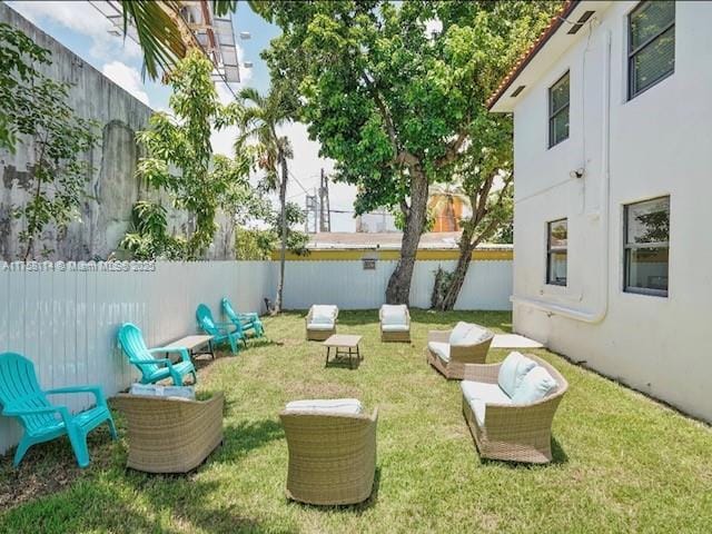 view of yard with a fenced backyard