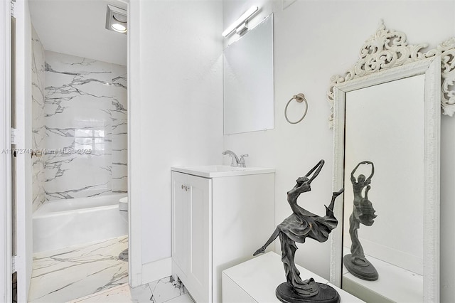 300 Bayview Dr Unit 308, Sunny Isles Beach, FL 33160 - bathroom with marble look tile flooring, vanity, and  shower combination