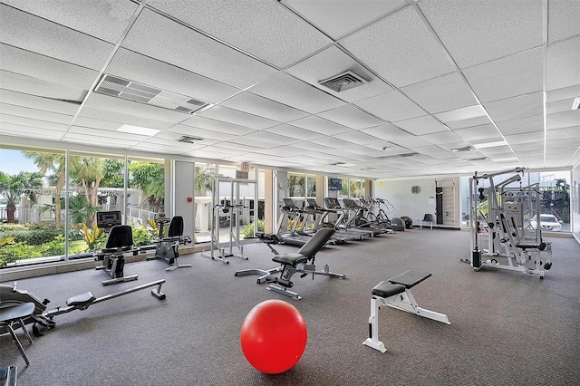 300 Bayview Dr Unit 308, Sunny Isles Beach, FL 33160 - workout area with a wall of windows and a paneled ceiling
