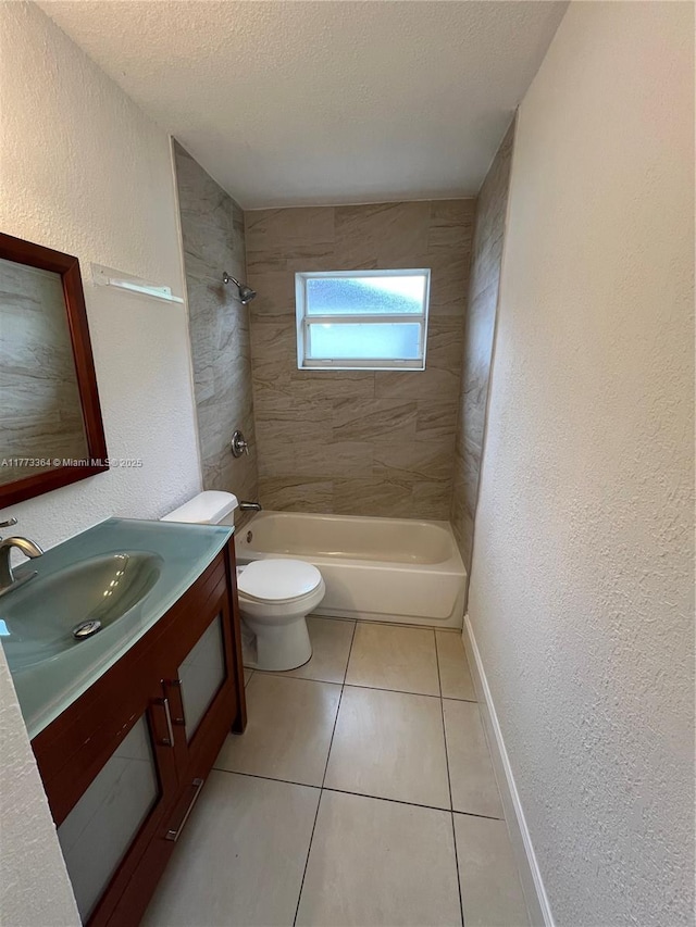 full bath featuring a textured ceiling, tile patterned floors, vanity, a textured wall, and shower / bath combination