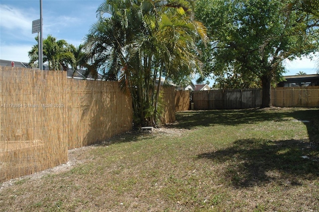 view of yard featuring a fenced backyard