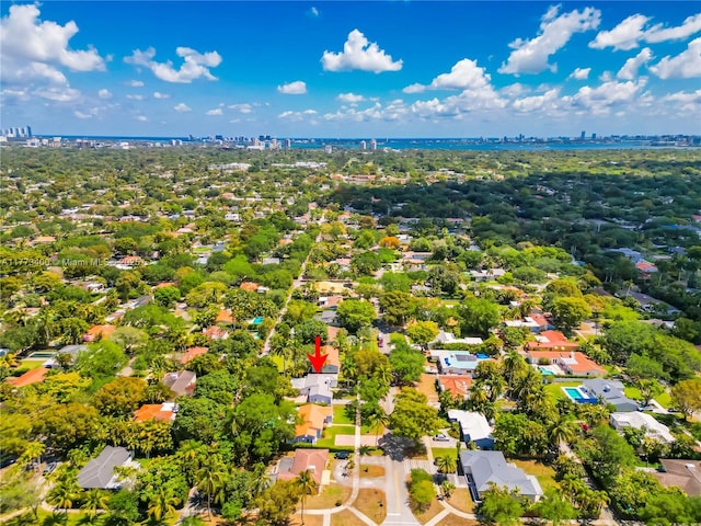 birds eye view of property with a city view