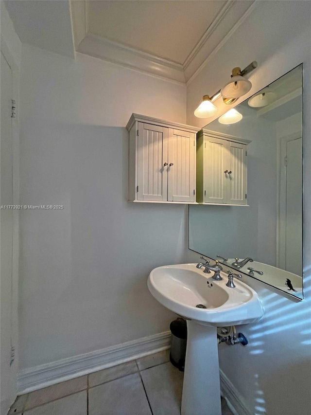 6709 N Kendall Dr Unit 227, Pinecrest, FL 33156 - bathroom featuring ornamental molding, baseboards, tile patterned flooring, and a sink