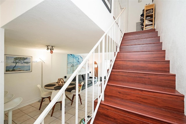 6709 N Kendall Dr Unit 227, Pinecrest, FL 33156 - stairs featuring tile patterned flooring and baseboards