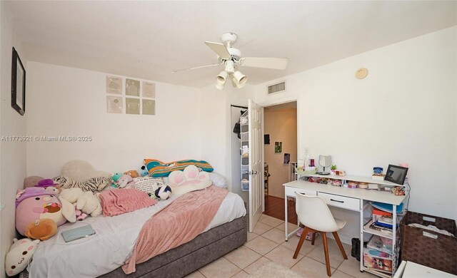 6709 N Kendall Dr Unit 227, Pinecrest, FL 33156 - bedroom with light tile patterned floors and a ceiling fan
