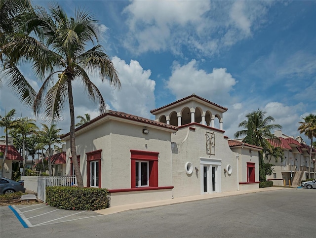 6709 N Kendall Dr Unit 227, Pinecrest, FL 33156 - view of building exterior featuring uncovered parking