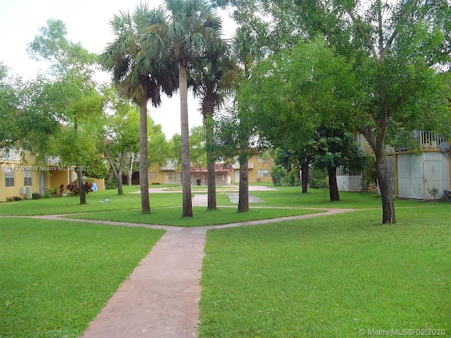 505 NW 177th St Unit 103, Miami Gardens, FL 33169 - view of property's community with a yard
