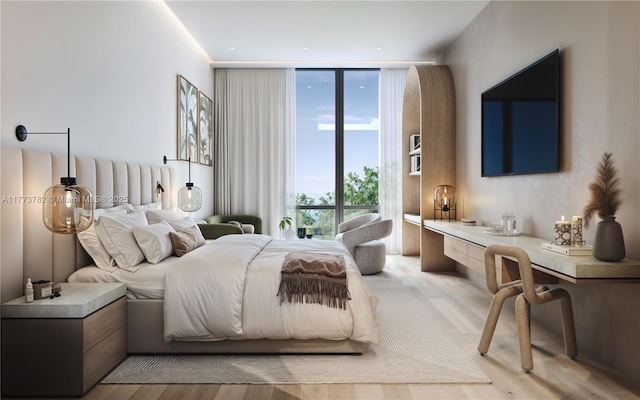 bedroom with floor to ceiling windows and wood finished floors