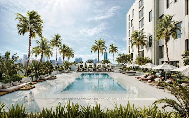 community pool with a patio area
