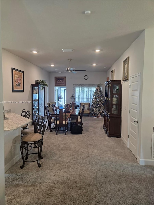 5317 Lugo St, Fort Pierce, FL 34951 - carpeted dining area with baseboards, ceiling fan, and recessed lighting