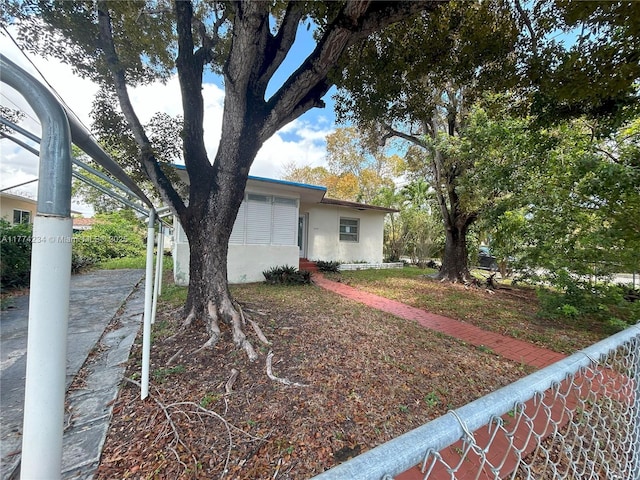3401 SW 14th St, Miami, FL 33145 - view of side of home with stucco siding