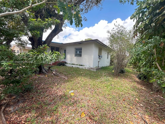 3401 SW 14th St, Miami, FL 33145 - view of home's exterior featuring stucco siding