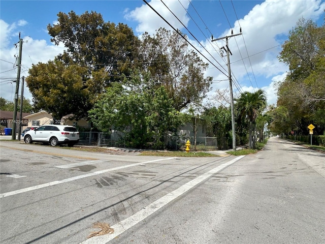 3401 SW 14th St, Miami, FL 33145 - view of asphalt road with traffic signs