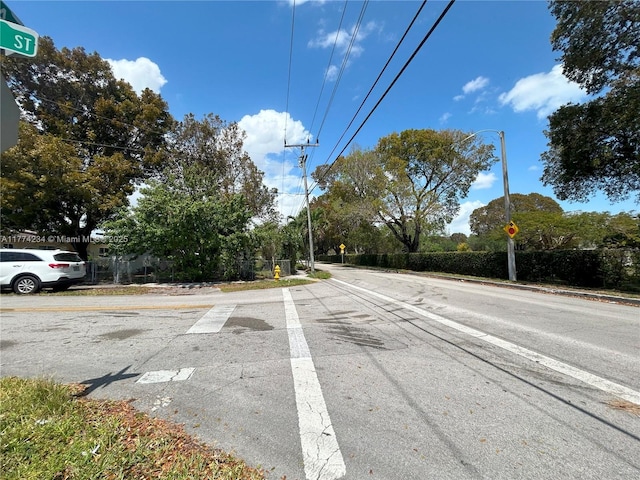3401 SW 14th St, Miami, FL 33145 - view of asphalt street featuring traffic signs
