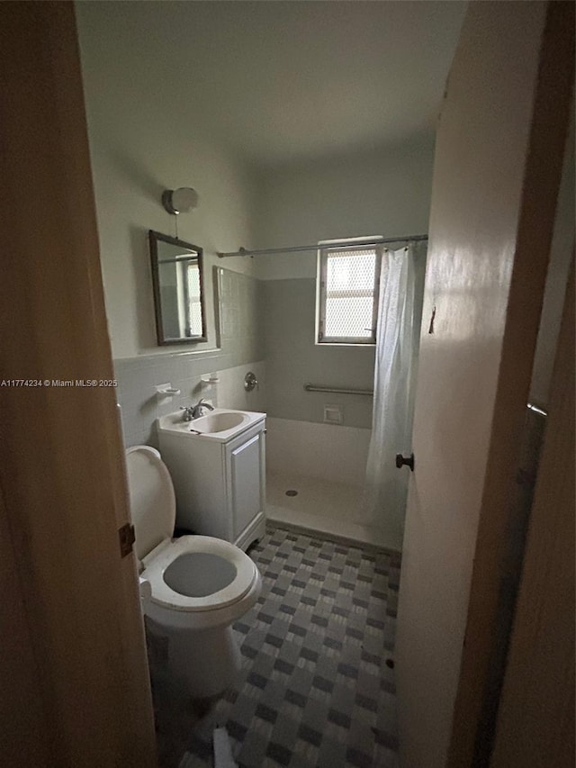 3401 SW 14th St, Miami, FL 33145 - full bathroom featuring curtained shower, toilet, vanity, and tile patterned floors