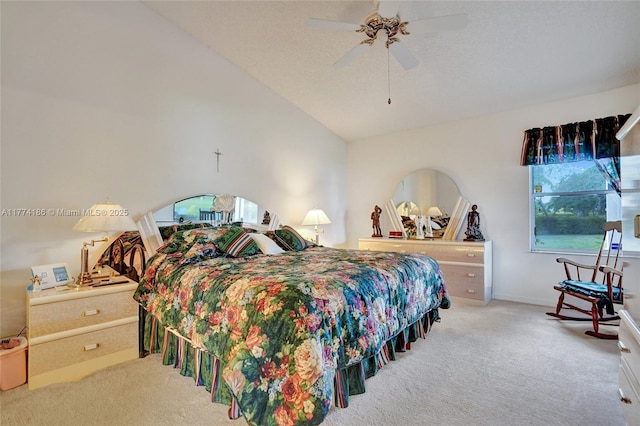 bedroom featuring lofted ceiling, ceiling fan, baseboards, and carpet floors