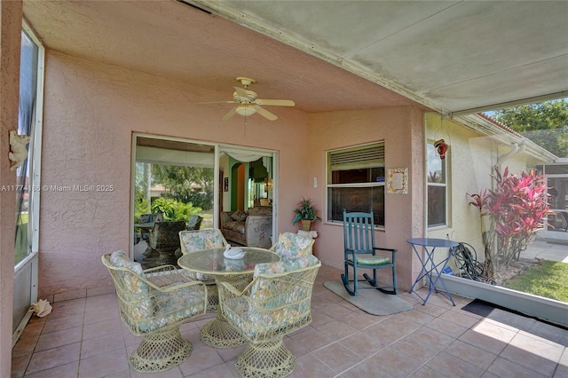 view of patio / terrace featuring a ceiling fan