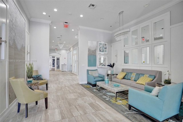 living room with crown molding, baseboards, visible vents, and recessed lighting