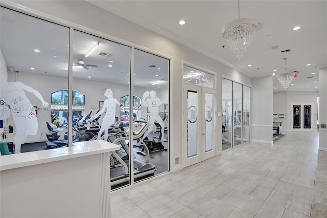 gym featuring french doors, visible vents, and recessed lighting