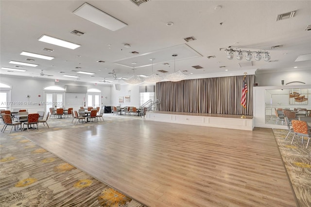 miscellaneous room featuring visible vents and light wood finished floors