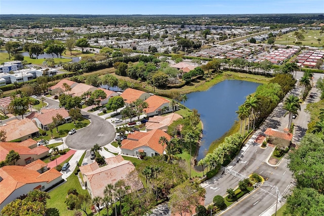 aerial view with a water view and a residential view