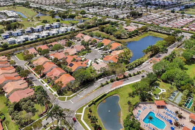 birds eye view of property featuring a residential view and a water view