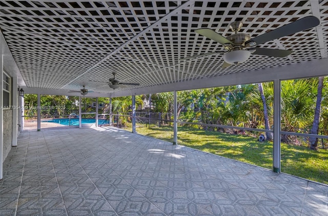 11390 NW 37th St, Coral Springs, FL 33065 - view of patio / terrace with ceiling fan, a lanai, an outdoor pool, and fence