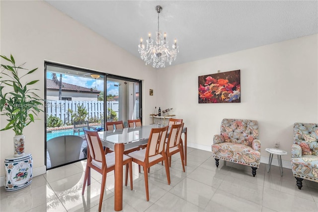 519 SW 88th Pl E, Miami, FL 33174 - dining area featuring a chandelier, lofted ceiling, and light tile patterned flooring