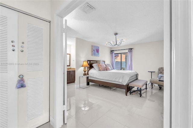 519 SW 88th Pl E, Miami, FL 33174 - bedroom with a chandelier, baseboards, light tile patterned flooring, and a textured ceiling