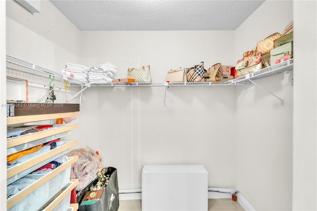 519 SW 88th Pl E, Miami, FL 33174 - spacious closet featuring tile patterned flooring