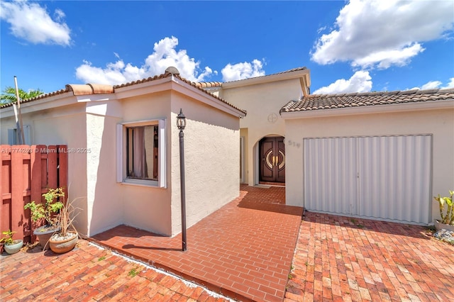 519 SW 88th Pl E, Miami, FL 33174 - mediterranean / spanish house with stucco siding, a tile roof, and a patio