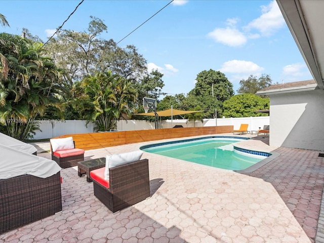 4991 SW 29th Way, Dania Beach, FL 33312 - view of pool with a fenced backyard, a patio, and an outdoor hangout area