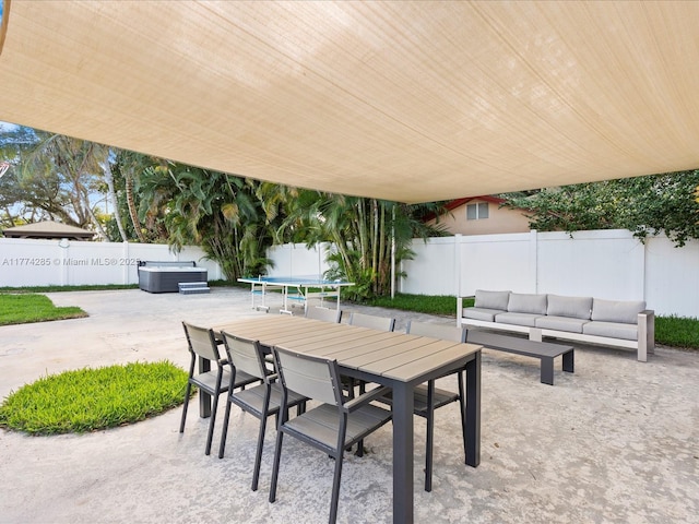4991 SW 29th Way, Dania Beach, FL 33312 - view of patio with a trampoline, a fenced backyard, outdoor lounge area, and outdoor dining area