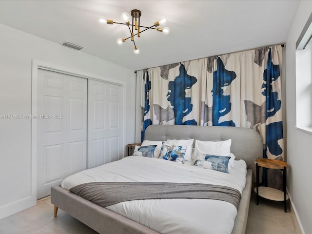 4991 SW 29th Way, Dania Beach, FL 33312 - bedroom featuring a closet, baseboards, and a chandelier