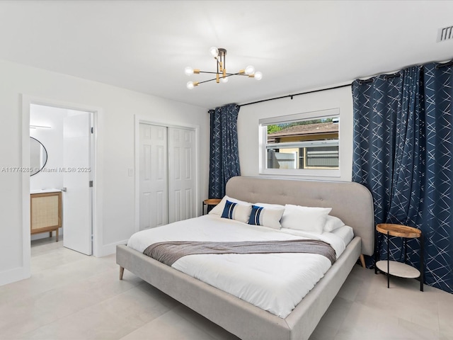 4991 SW 29th Way, Dania Beach, FL 33312 - bedroom with a chandelier, a closet, baseboards, and connected bathroom