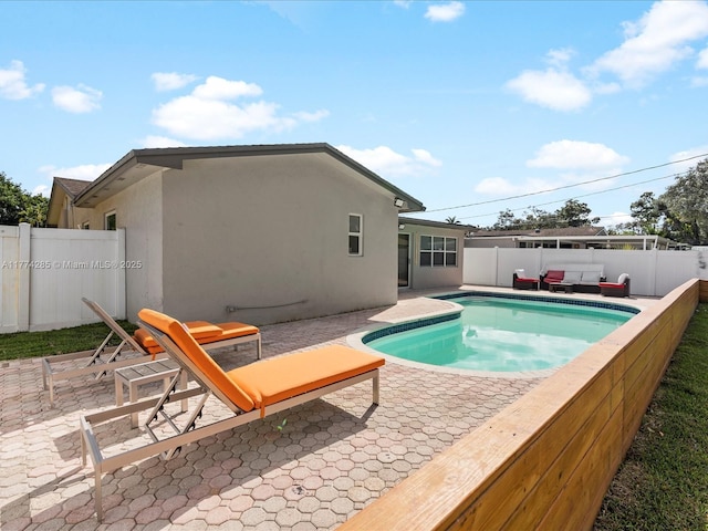 4991 SW 29th Way, Dania Beach, FL 33312 - view of swimming pool featuring a patio area and a fenced backyard