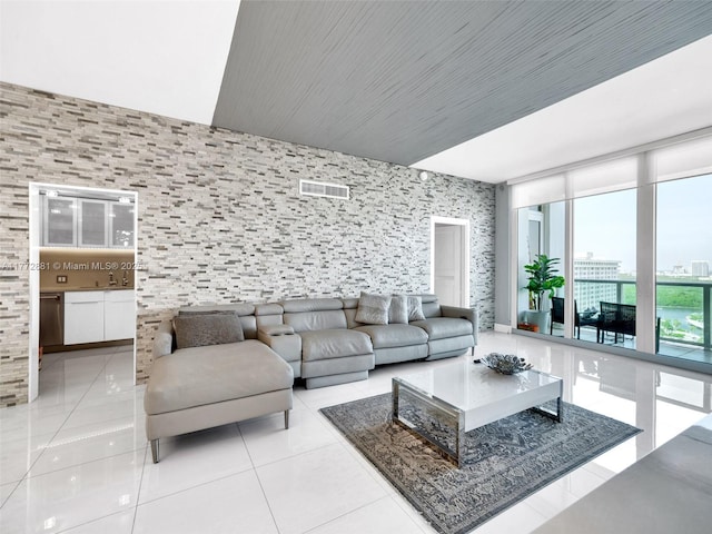 100 Bayview Dr Unit Ph01, Sunny Isles Beach, FL 33160 - living room featuring a city view, visible vents, and light tile patterned floors