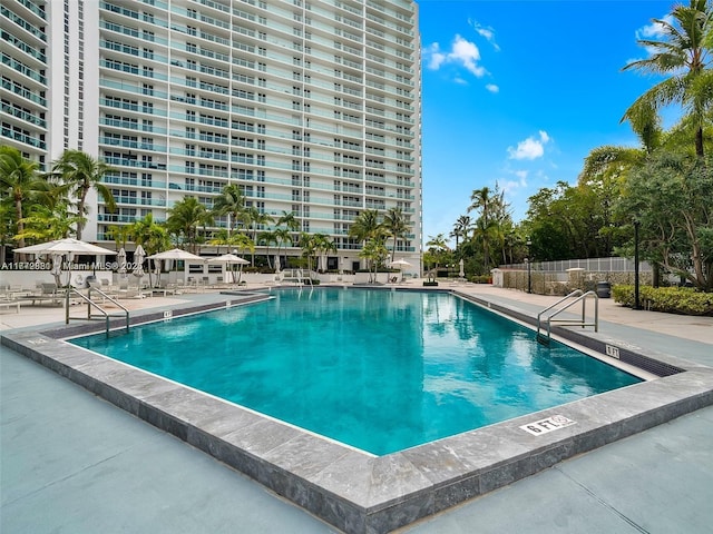 100 Bayview Dr Unit Ph01, Sunny Isles Beach, FL 33160 - community pool featuring fence and a patio area