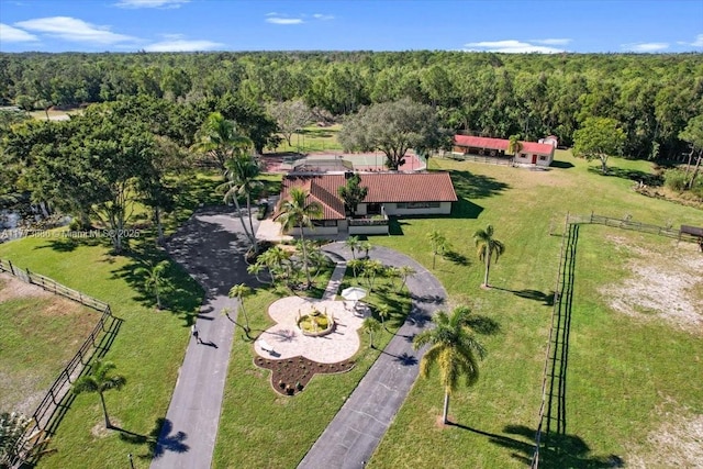 3761 Dellwood Blvd, Loxahatchee, FL 33470 - view of subject property featuring a heavily wooded area