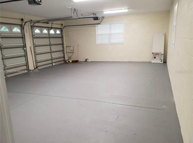 1950 S Tanner Rd, Orlando, FL 32820 - garage featuring a garage door opener