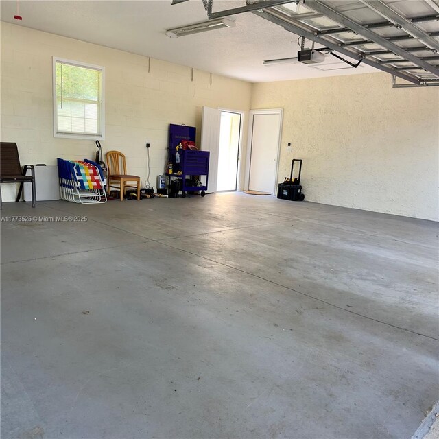 1950 S Tanner Rd, Orlando, FL 32820 - garage featuring a garage door opener