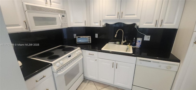 1950 S Ocean Dr Unit 6G, Hallandale Beach, FL 33009 - kitchen featuring white appliances, a sink, and white cabinets