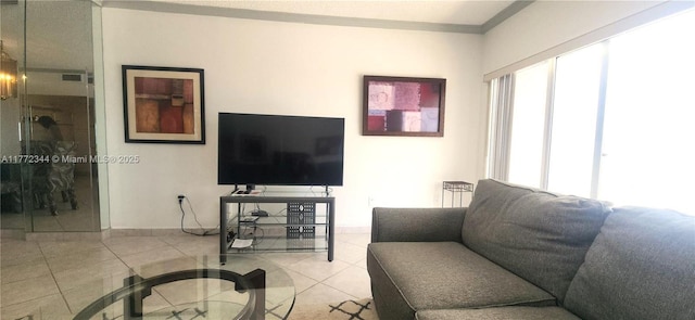 1950 S Ocean Dr Unit 6G, Hallandale Beach, FL 33009 - living room featuring light tile patterned floors and ornamental molding