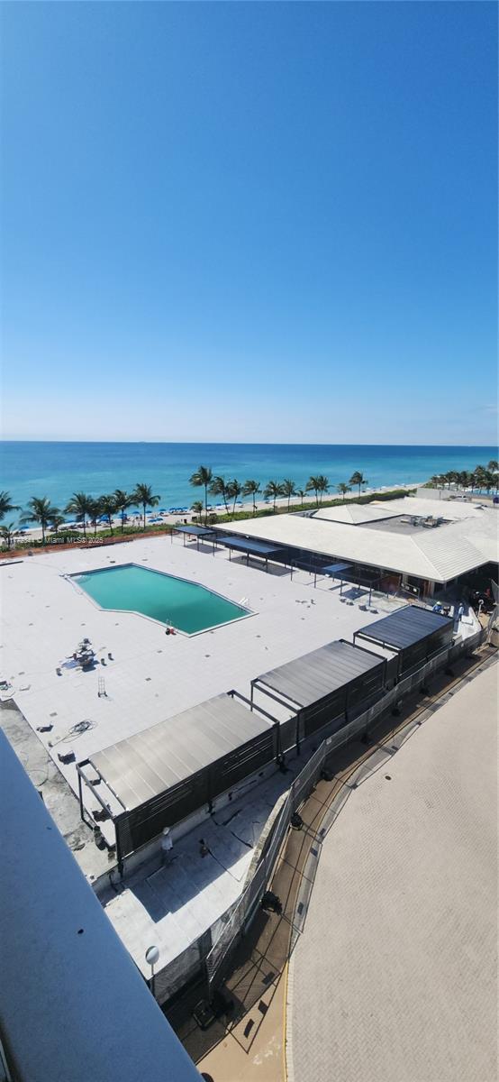 1950 S Ocean Dr Unit 6G, Hallandale Beach, FL 33009 - view of swimming pool featuring a water view