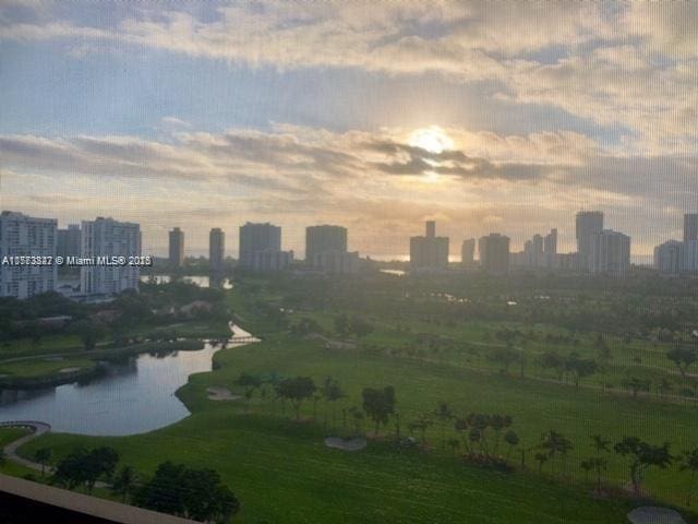 property's view of city featuring a water view