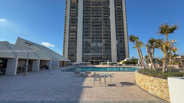 pool featuring a patio area